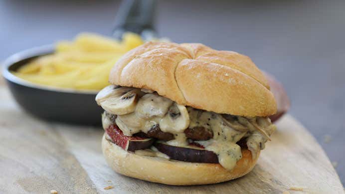 Beef burger with creamy mushroom sauce