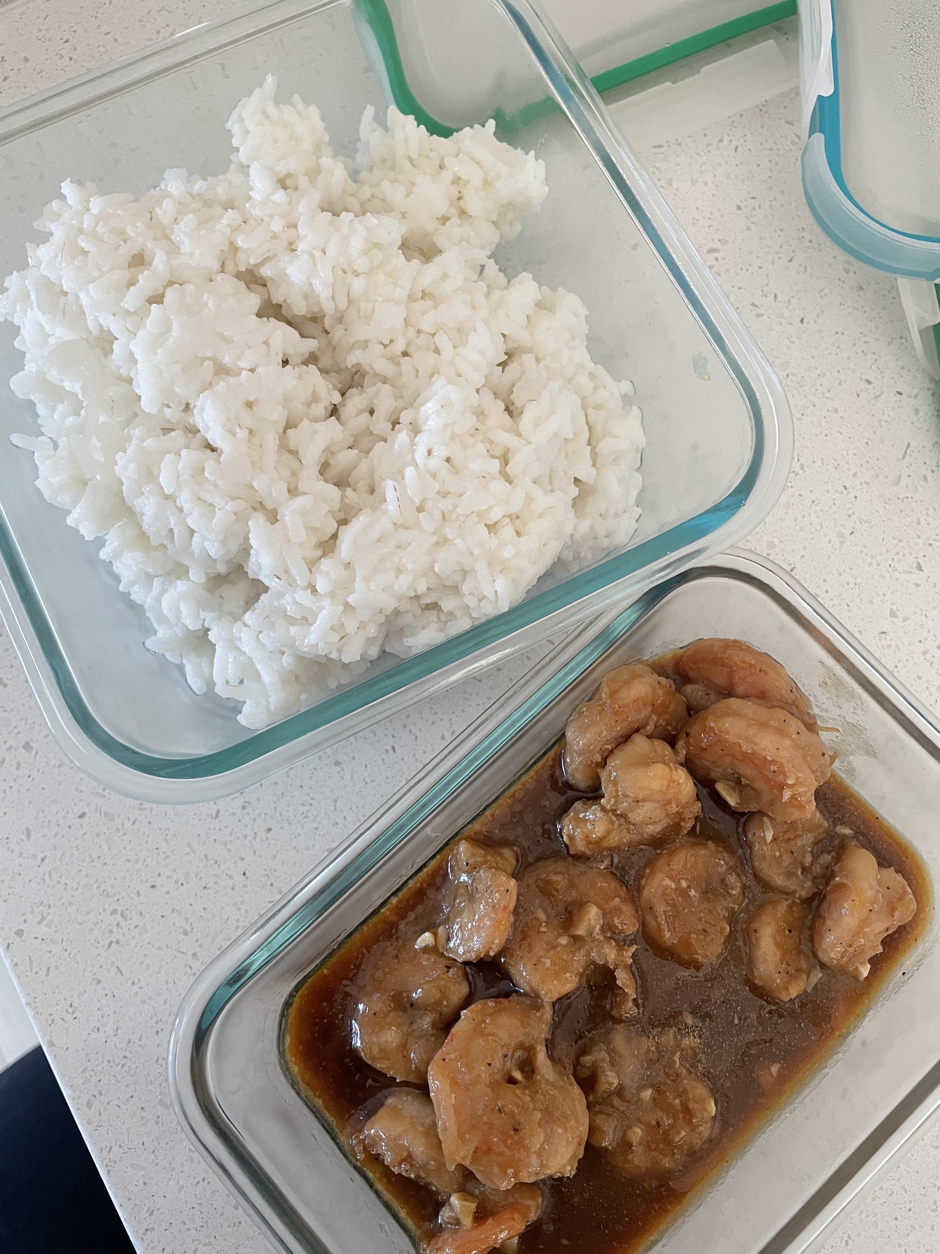 leftover shrimp and rice in tupperware