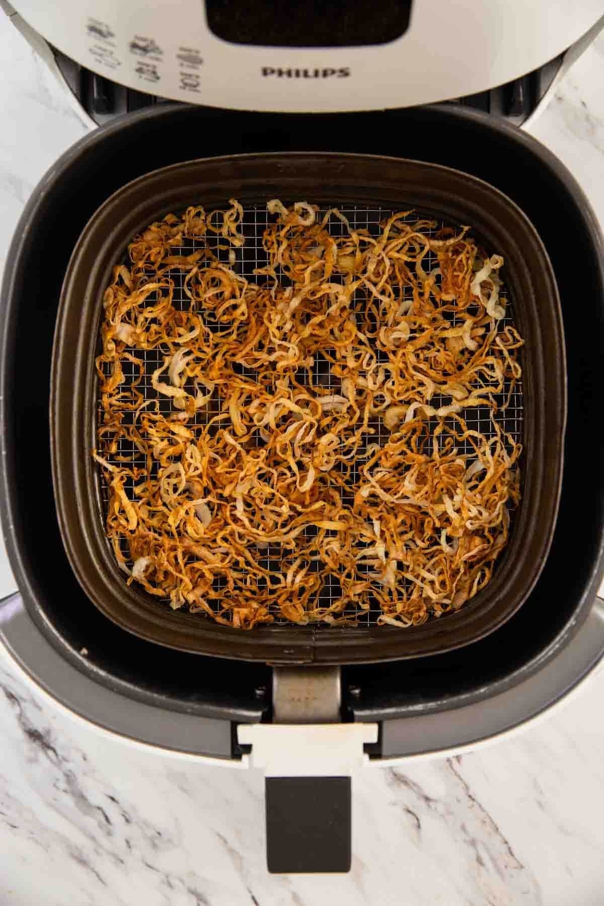 Crispy fried onions in an air fryer.