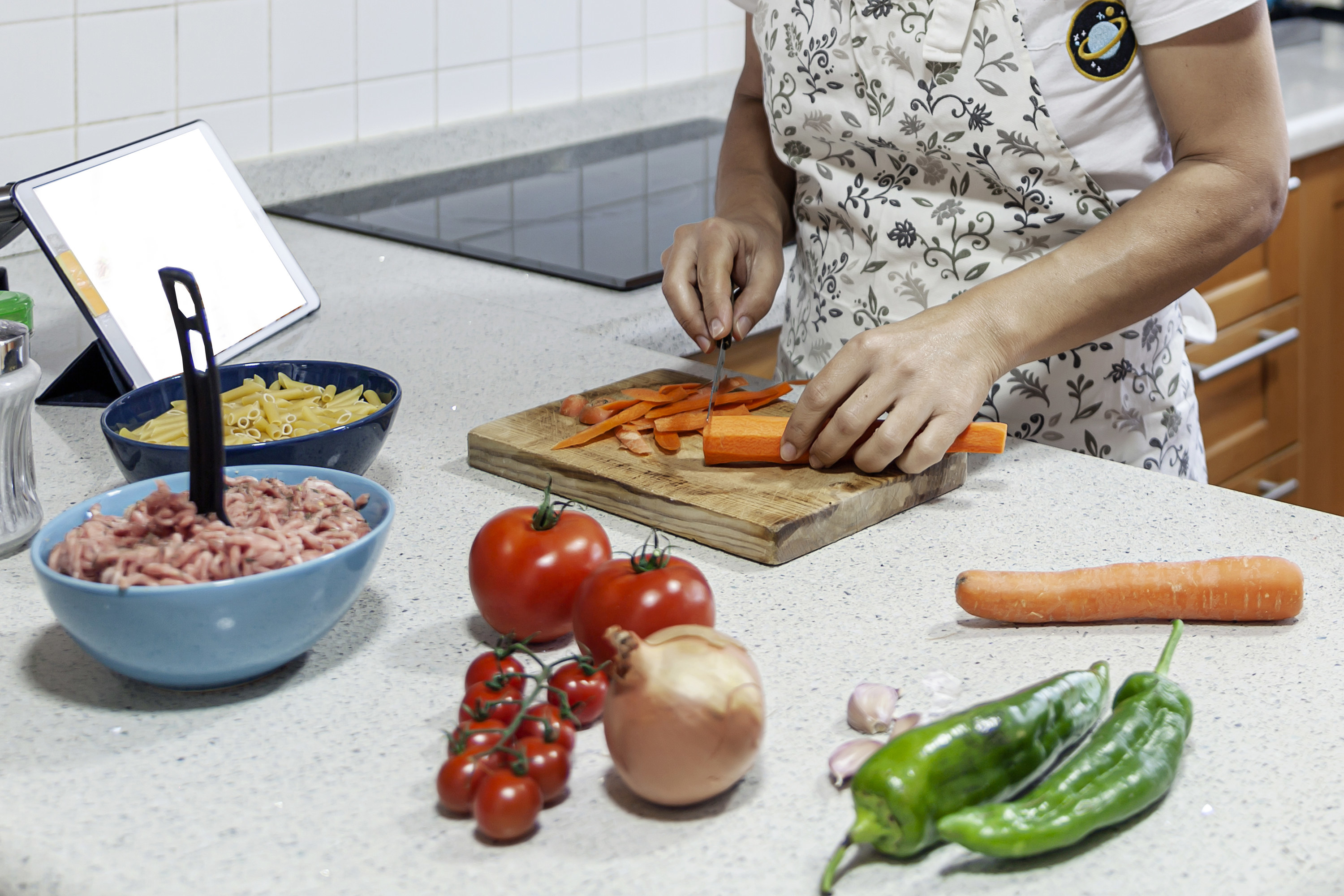 Woman prepping veggies.